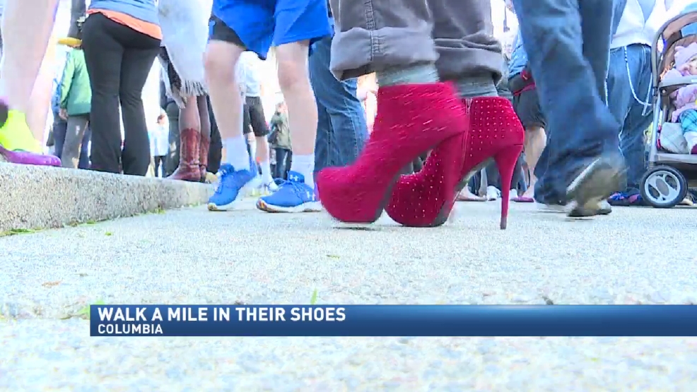 Hundreds gather in Downtown Columbia for "Walk a Mile in Her Shoes
