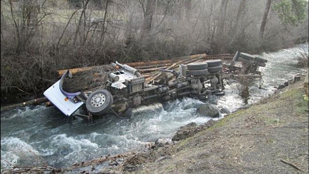 140325-log-truck-into-creek-660.jpg