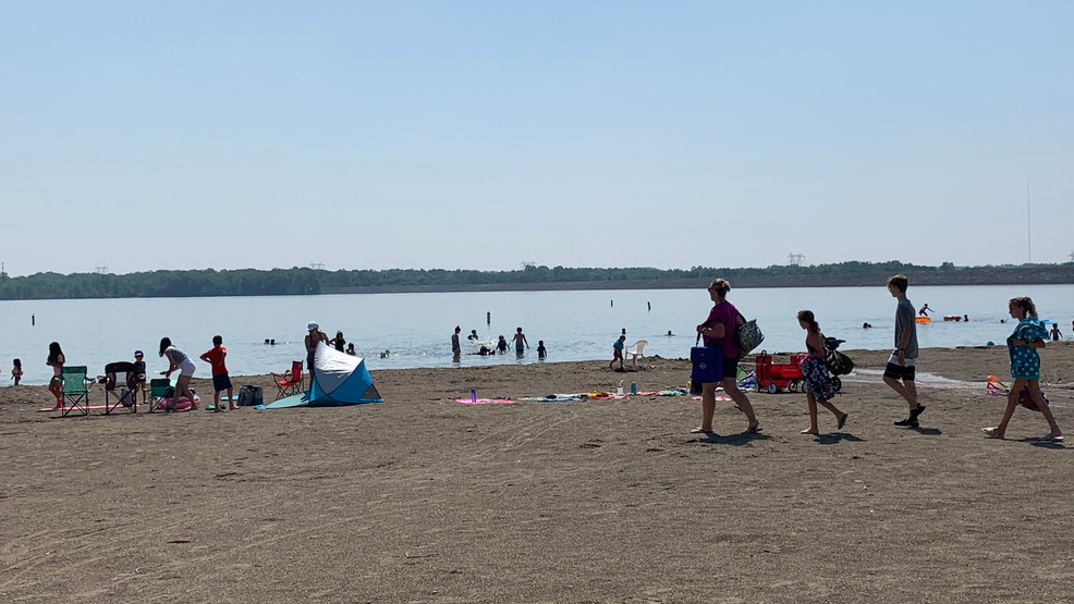 Beachgoers beat the heat at Alum Creek State Park on another 90 degree