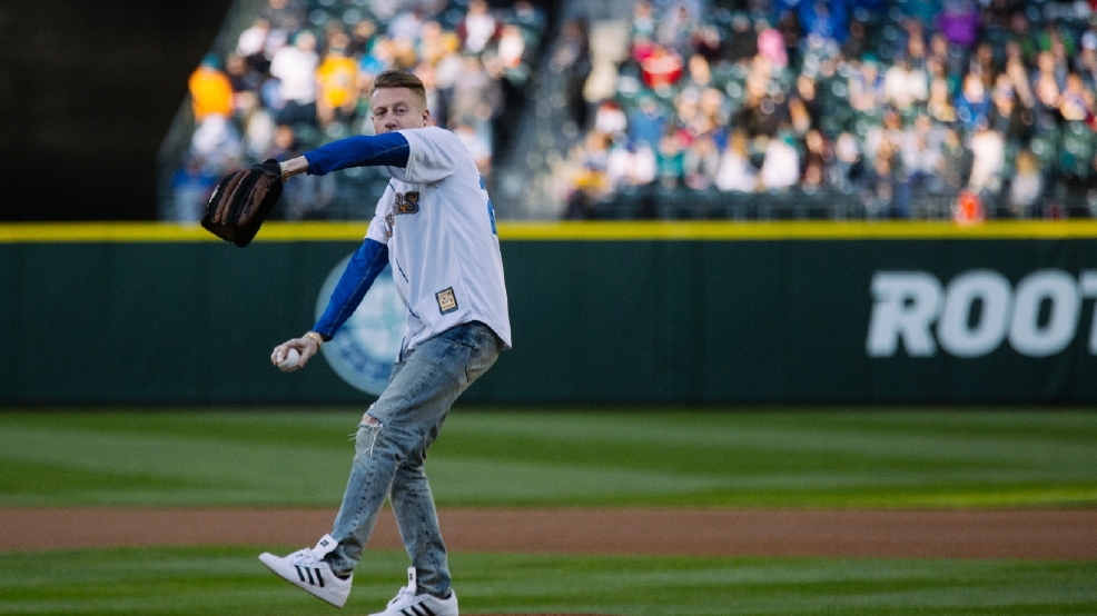 Photos Macklemore throws out first pitch at Mariners v. Royals